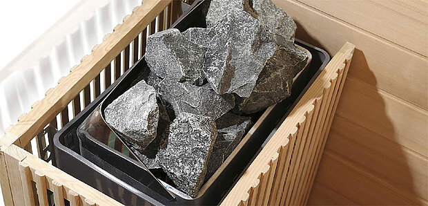 Lavasteine im Saunaofen der finnischen Sauna Igneus 