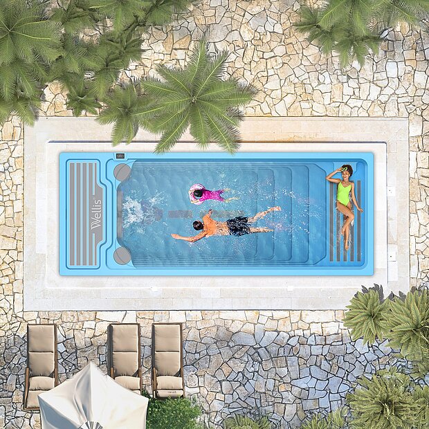 Swimspa Wellis Beachclub – Luxus, Wellness & Sport genießen Draufsicht auf den Swimspa Wellis Beachclub, perfekt für Wellness und Sport: moderner Swimspa mit Gegenstromanlage für sportliches Schwimmen, kombiniert mit entspannenden Whirlpool-Funktionen, umgeben von stilvollen Sonnenliegen, Palmen und luxuriösem Beachclub-Ambiente – ideal für Fitness, Erholung und Lifestyle.