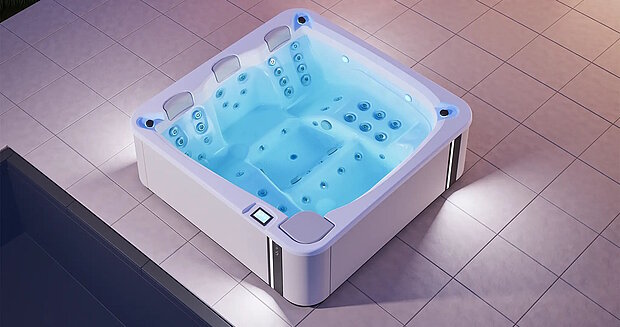 Whirlpool Touch 5 Pro von Aquavia, quadratischer Whirlpool mit blauen Wasserstrahlen, 6 Sitzplätzen, LED-Beleuchtung und Steuerungspanel.